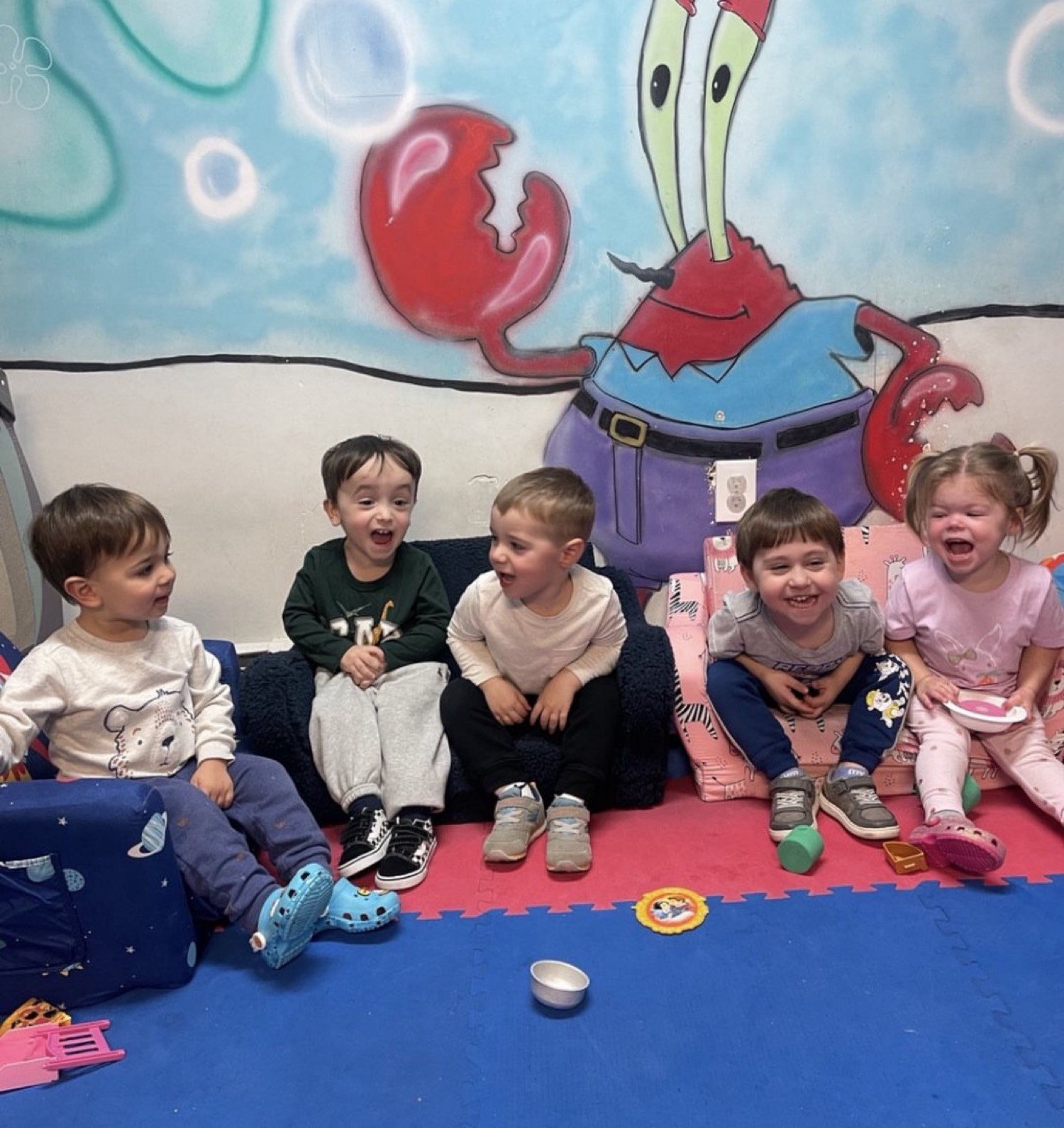 Children laughing together at My Piccolo Mondo