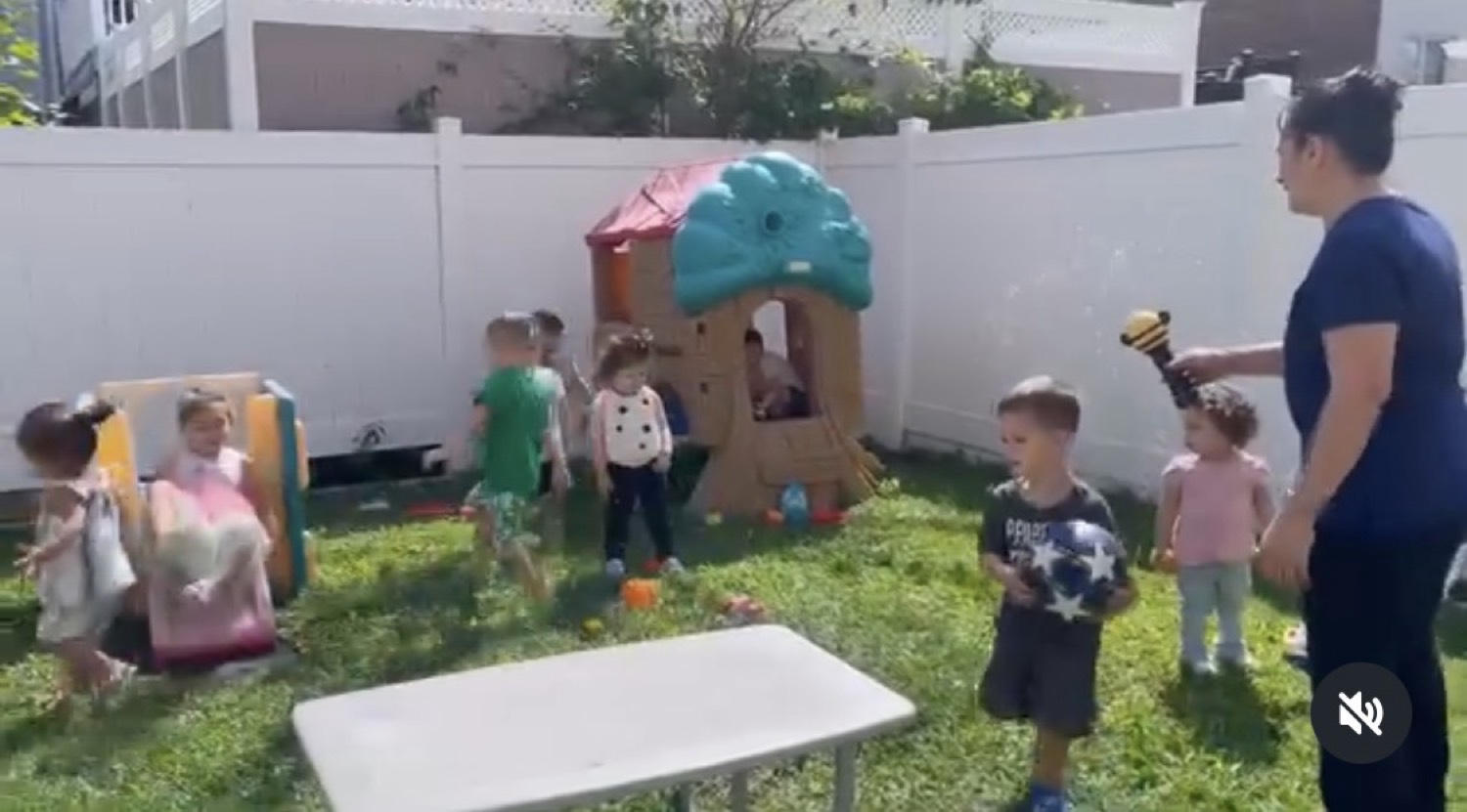 Outdoor play in the backyard at My Piccolo Mondo